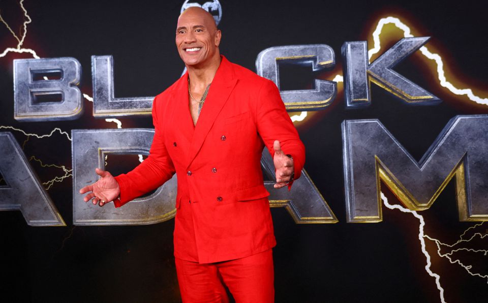 Actor Dwayne Johnson posses for photographers as he arrives for the world premiere of the film 'Black Adam' in Times Square in New York City, New York, US, on October 12, 2022. REUTERS/Mike Segar/File Photo