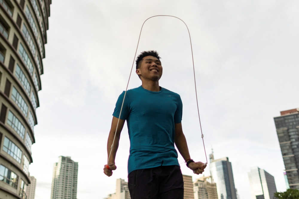 Guinness World Records holder Ryan Alonzo practices with his jump rope in Makati City, Metro Manila, Philippines, September 9, 2022. REUTERS/Eloisa Lopez