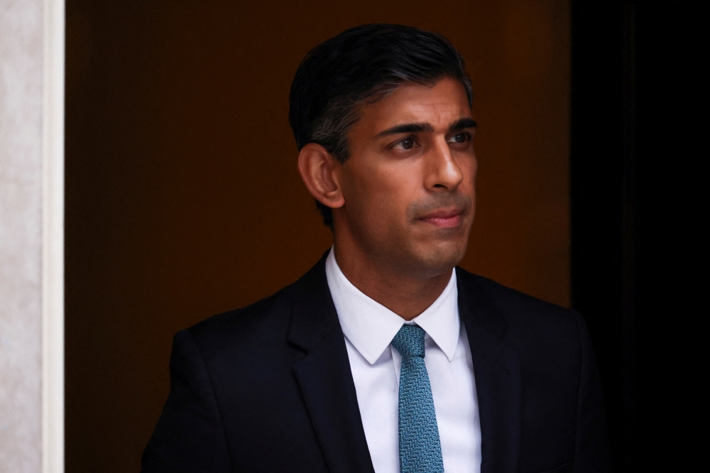 Britain's Prime Minister Rishi Sunak walks outside Number 10 Downing Street, in London, Britain, October 26, 2022. REUTERS/Henry Nicholls
 
