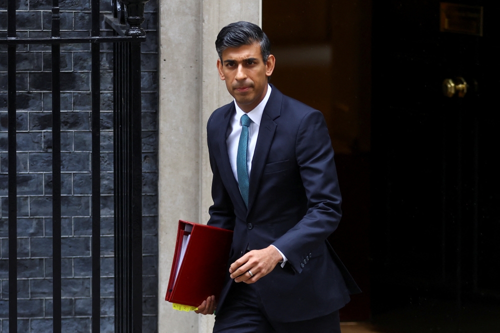 Britain's Prime Minister Rishi Sunak walks outside Number 10 Downing Street, in London, Britain, October 26, 2022. Reuters/Hannah Mckay