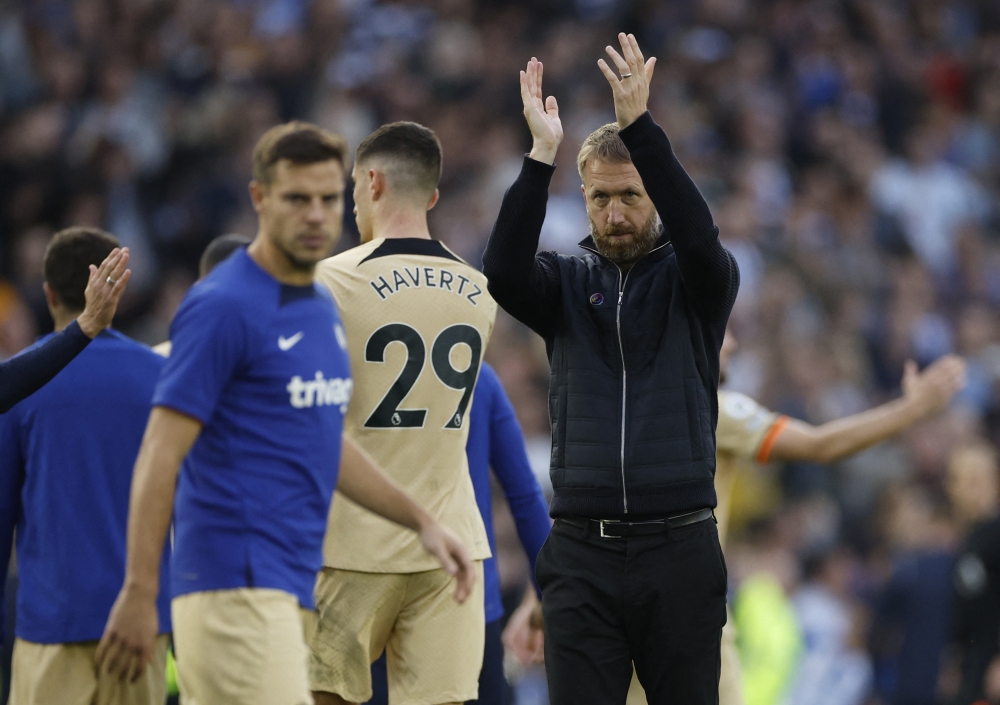 Chelsea manager Graham Potter applauds fans after their EPL match against Bighton & Hove Albion at The American Express Community Stadium, Brighton, Britain, on October 29, 2022.  Action Images via Reuters/John Sibley