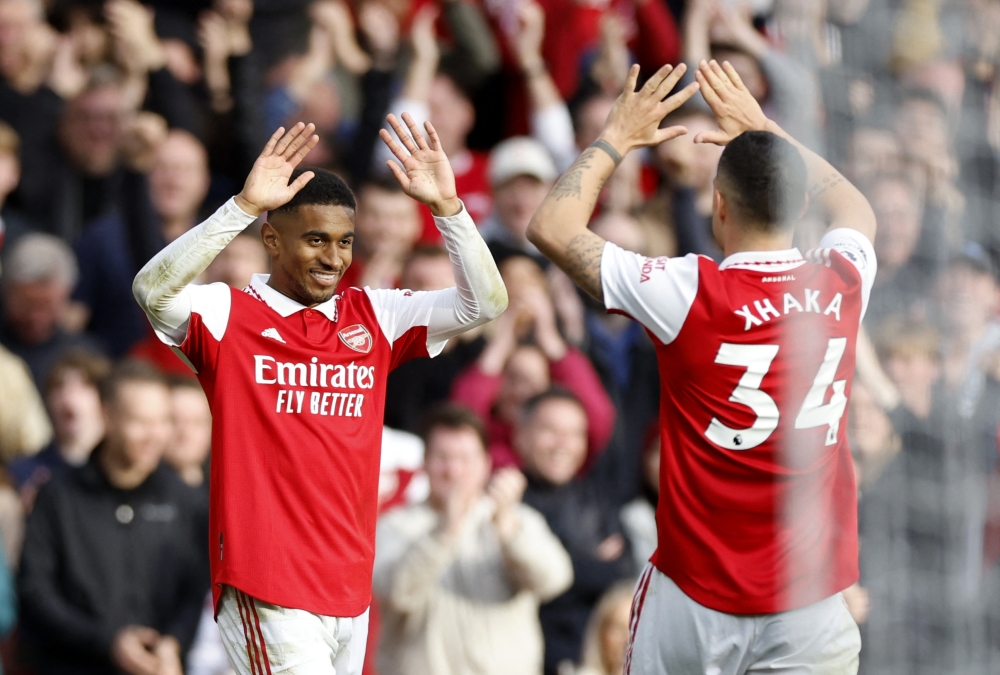 Arsenal's Reiss Nelson celebrates scoring their third goal with Granit Xhaka during the Premier League match against  Nottingham Forest at the Emirates Stadium, London, on October 30, 2022.  Action Images via Reuters/Peter Cziborra