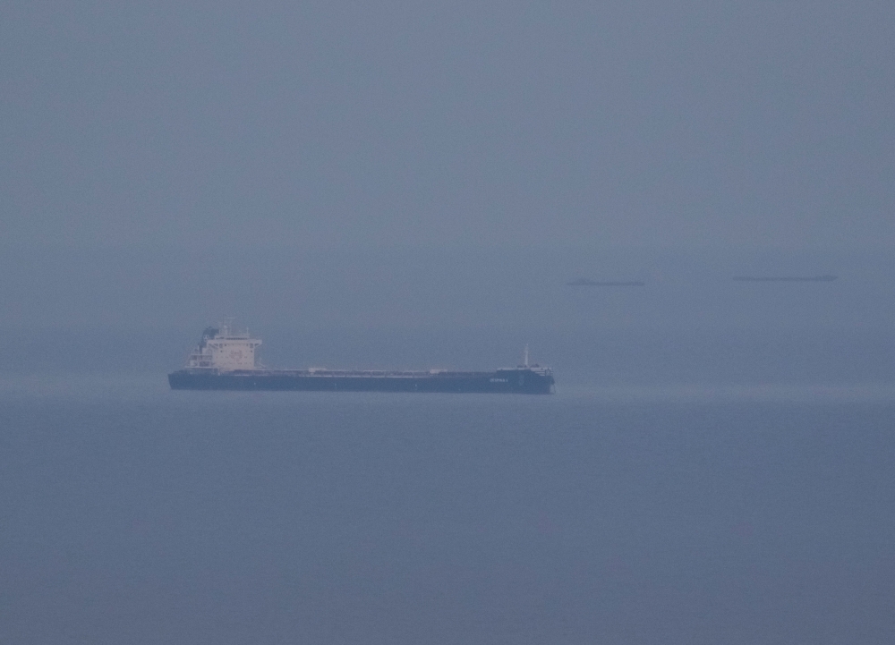 Grain ships carrying Ukrainian grain are seen in the Black Sea, amid Russia's attack on Ukraine, near Ukrainian port of Odesa, Ukraine, on October 30, 2022. REUTERS/Serhii Smolientsev