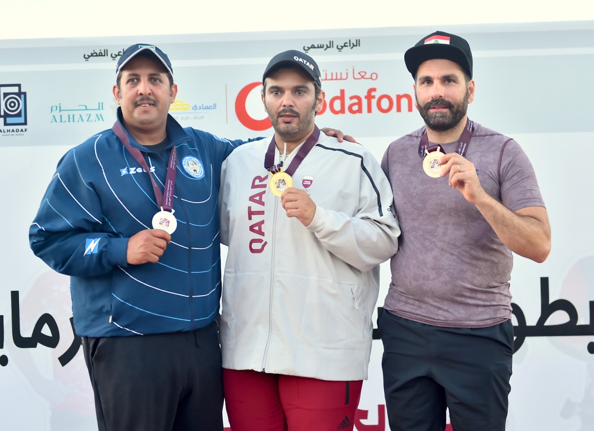 Qatar's Saeed Abu Shareb (centre) celebrates on the podium with Kuwait’s Mansour Al Rashidi and Samer Sarkis of Lebanon. Pic: Abdul Basit