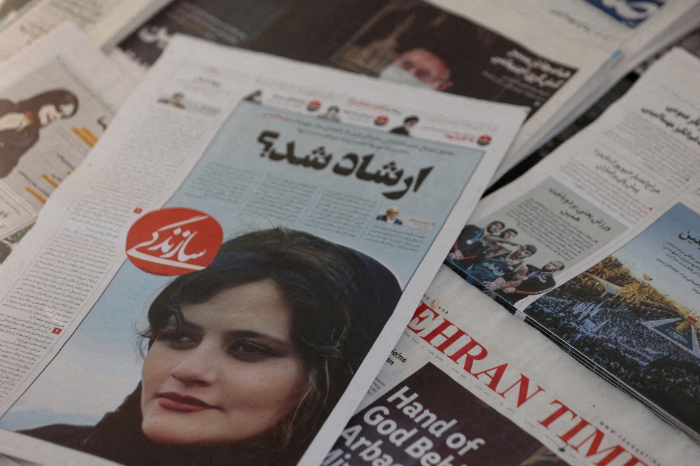 A newspaper with a cover picture of Mahsa Amini, a woman who died after being arrested by Iranian morality police is seen in Tehran, Iran, on September 18, 2022. File Photo / Reuters