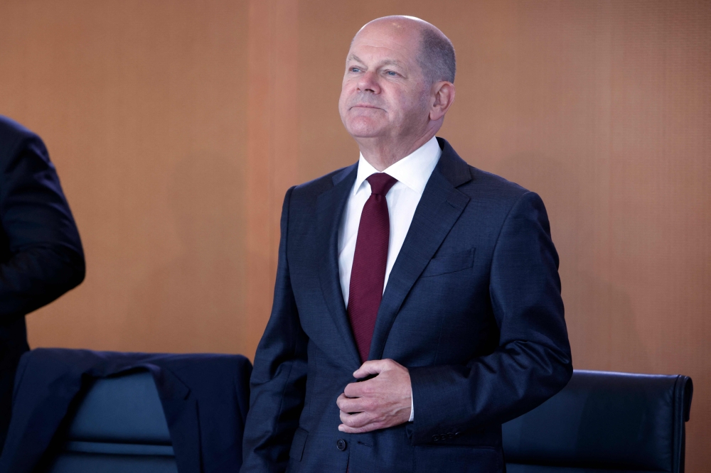German Chancellor Olaf Scholz looks on as he arrives prior to the start of the weekly cabinet meeting at the Chancellery in Berlin on November 2, 2022. (Photo by MICHELE TANTUSSI / AFP)