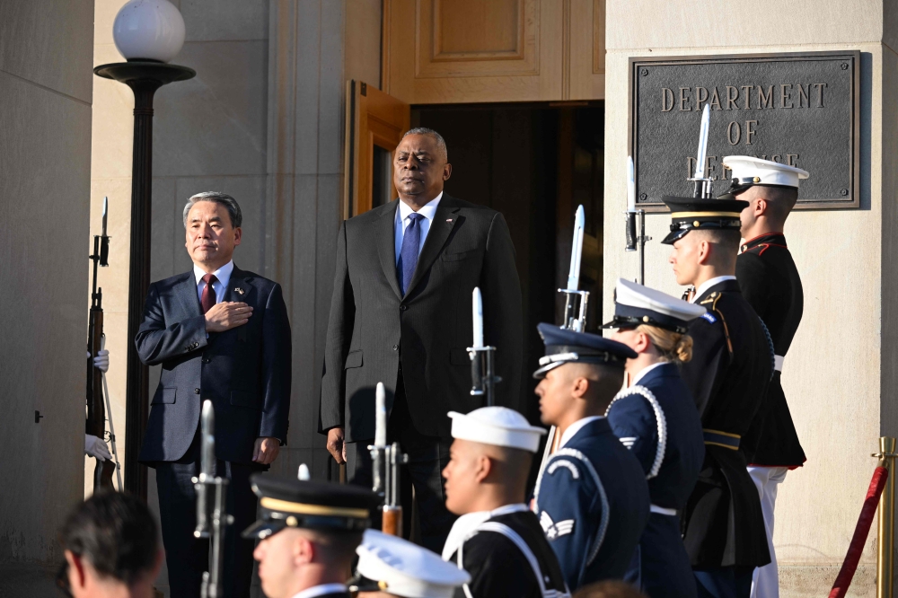 US Defense Secretary Lloyd Austin welcomes South Korean Defense Minister Lee Jong-Sup to the Pentagon in Washington, DC, on November 3, 2022. (Photo by Mandel NGAN / AFP)