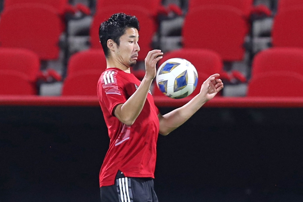 This file photo taken on November 15, 2021 shows Japan's defender Yuta Nakayama attending a training session in Muscat on the eve of the 2022 Qatar football World Cup Asian qualifying match between Oman and Japan. (Photo by Haitham AL-SHUKAIRI / AFP)