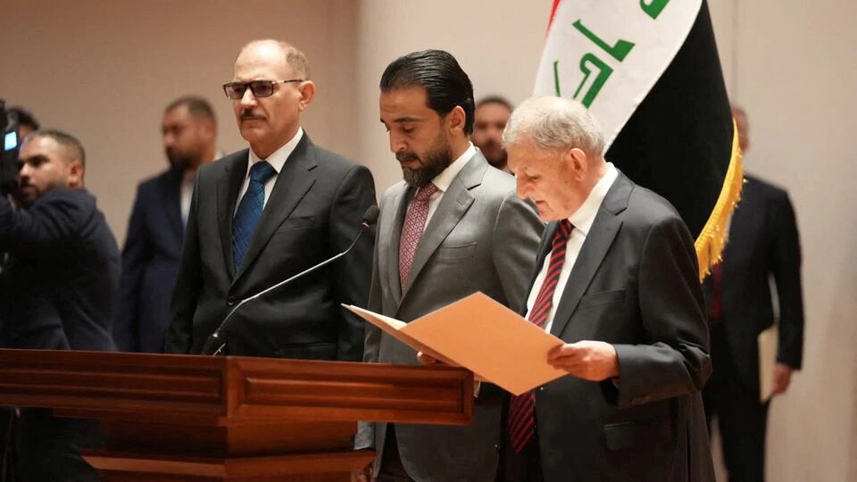 Iraqi President Abdul Latif Rashid takes his oath of office in front of Iraqi lawmakers in Baghdad, Iraq, October 13, 2022. Iraqi Parliament Media Office/Handout via REUTERS