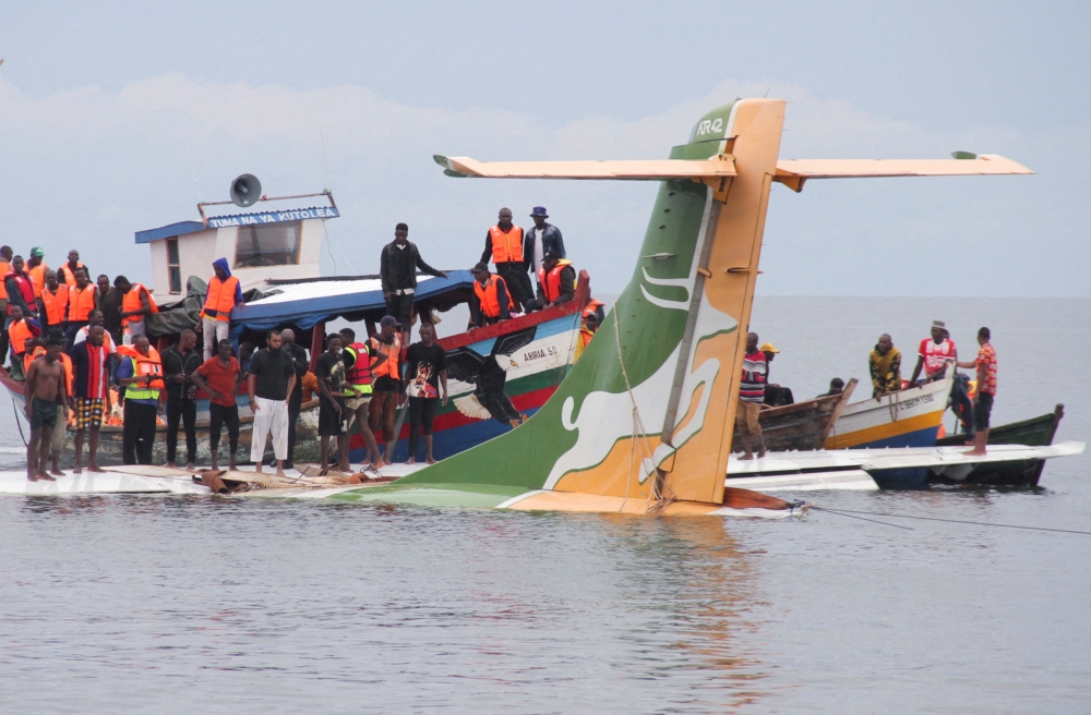 Rescuers attempt to recover the Precision Air passenger plane that crashed into Lake Victoria in Bukoba, Tanzania, November 6, 2022. (REUTERS)