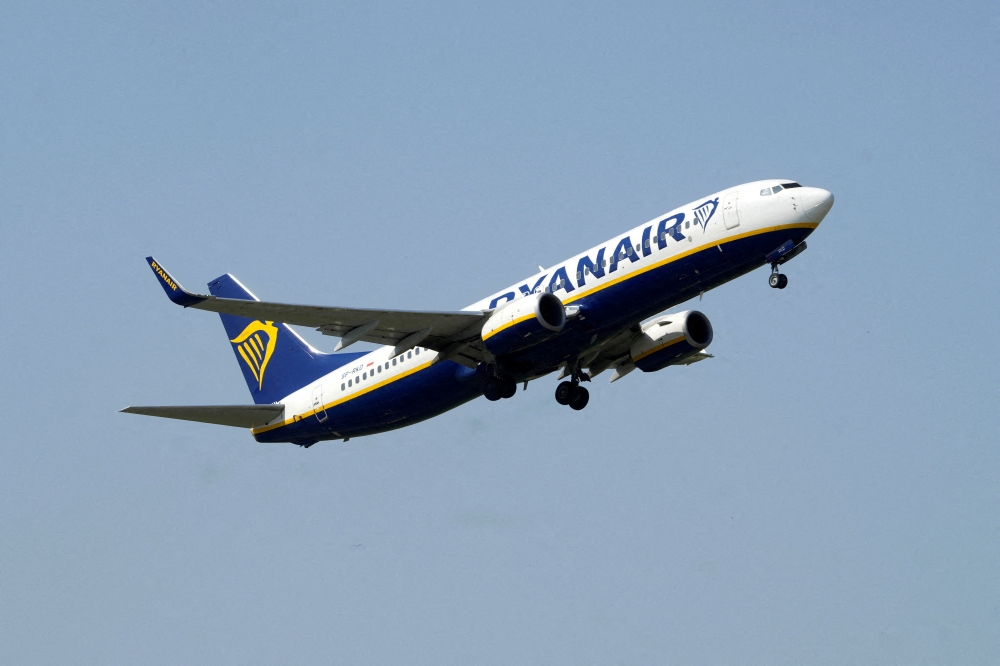 Ryanair aircraft Boeing 737-8AS takes off from Riga International Airport, Latvia, July 21, 2022. (REUTERS/Ints Kalnins)