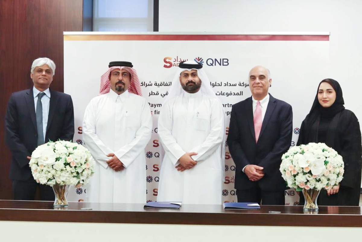 QNB & SADAD officials during the agreement signing.