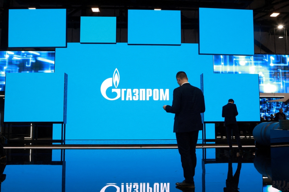 The logo of Gazprom is displayed on a screen during the Saint Petersburg international gas forum in Saint Petersburg, Russia, September 15, 2022. (REUTERS/Anton Vaganov)