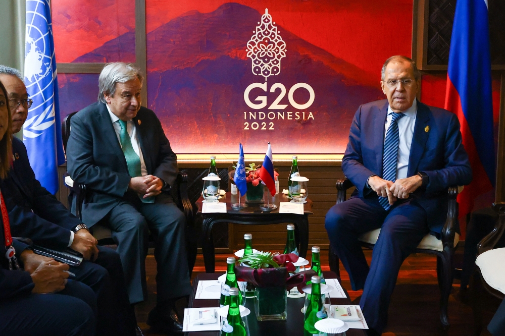 Russian Foreign Minister Sergei Lavrov and Secretary-General of the United Nations Antonio Guterres attend a meeting on the sidelines of the G20 summit in Bali, Indonesia, November 15, 2022. Russian Foreign Ministry/Handout via Reuters