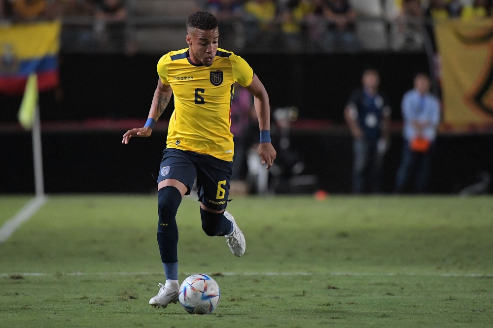 In this file photo taken on September 23, 2022, Ecuador's defender Byron Castillo controls the ball during the international friendly football match between Saudi Arabia and Ecuador at the Nueva Condomina stadium in Murcia, Ecuador. (AFP/Jose Jordan)