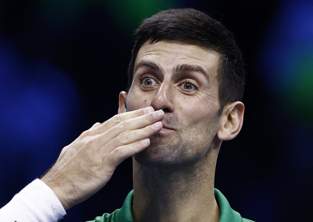 Serbia's Novak Djokovic celebrates after winning his group stage match against Russia's Andrey Rublev at the ATP Finals Turin in Turin, Italy, November 16, 2022. (REUTERS/Guglielmo Mangiapane)