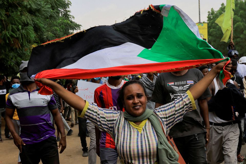 Protesters march during a rally against military rule following the last coup, in Khartoum, Sudan July 31, 2022. REUTERS/Mohamed Nureldin Abdallah/File Photo
