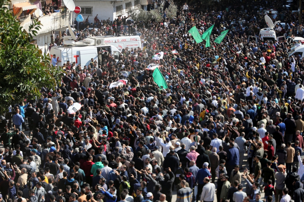 Palestinians attend the funeral of people who were killed in a fire that broke out during a party in the Gaza Strip, according to health and civil emergency officials in the northern Gaza Strip, November 18, 2022. (REUTERS/Ibraheem Abu Mustafa)