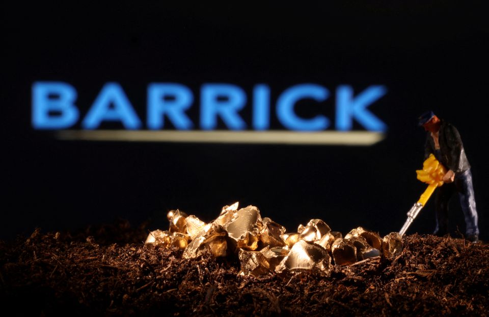 A small toy figure and gold imitation are seen in front of the Barrick logo in this illustration taken November 19, 2021. REUTERS/Dado Ruvic/Illustration/File Photo