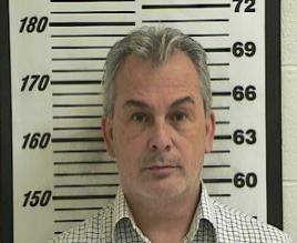Michael Taylor, who was implicated in enabling the dramatic escape of former Nissan Motor Co. boss Carlos Ghosn, is seen in a booking photograph from October 2012 on unrelated charges. | DAVIS COUNTY SHERRIFF'S OFFICE/ VIA REUTERS
