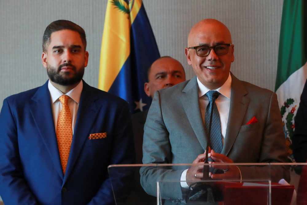 Jorge Rodriguez, President of Venezuela's National Assembly and Head of Nicolas Maduro's negotiating team, along with Nicolas Maduro Guerra, son of Venezuela's President, and members of Venezuela's government, talks to the media, in Mexico City, Mexico, on November 26, 2022. REUTERS/Henry Romero