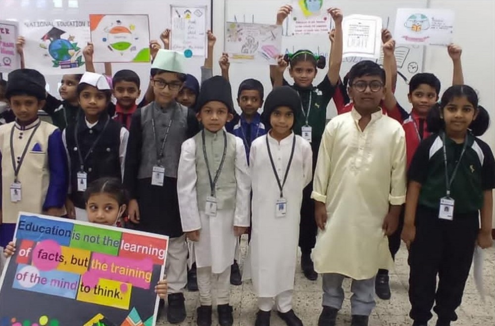MES students participating in an activity held to mark National Education Day of India.