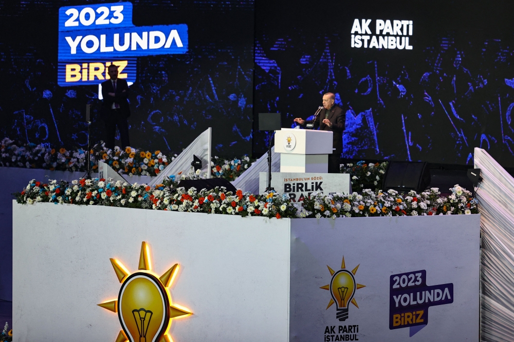 Turkish President Recep Tayyip Erdogan addresses a rally at the Galatasaray's Nef Stadium in Istanbul on November 27, 2022. (Photo by Yasin AKGUL / AFP)