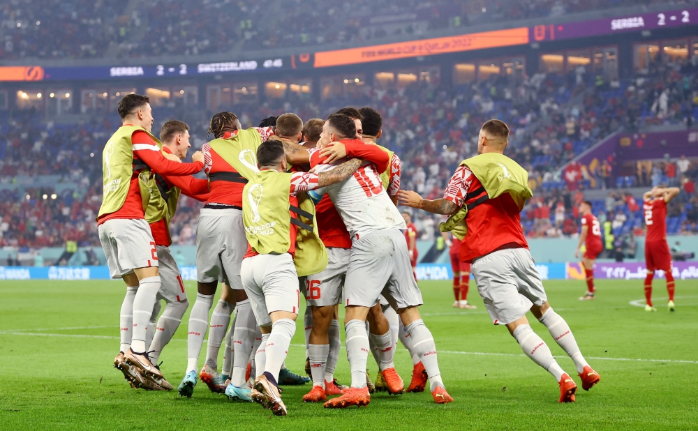 Switzerland's Remo Freuler celebrates scoring their third goal with Granit Xhaka, Ardon Jashari and teammates during the Qatar World Cup final Group G match between Switzerland and Serbia at Stadium 974 on December 2, 2022. (REUTERS/Hannah Mckay)