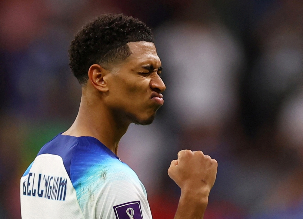 December 4, 2022 England's Jude Bellingham celebrates qualifying for the quarter finals REUTERS/Kai Pfaffenbach