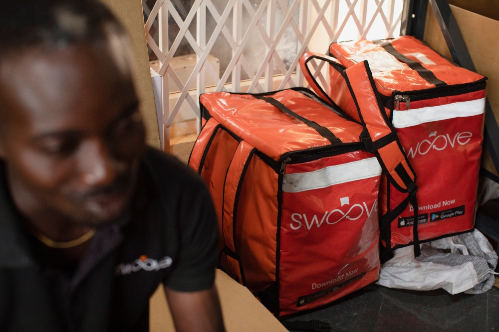 A worker prepares orders inside the office of Ghanaian courier logistics startup Swoove, in Accra, Ghana November 25, 2022. REUTERS/Francis Kokoroko