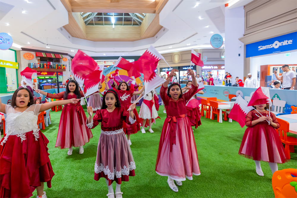 Men and children take part in fun activities at Hyatt Plaza.
