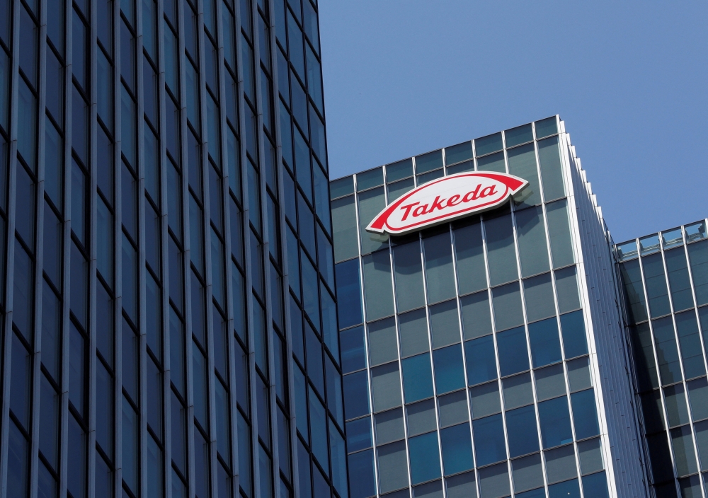 File Photo: Takeda Pharmaceutical Co's logo is seen at its new headquarters in Tokyo, Japan, July 2, 2018. (REUTERS/Kim Kyung-Hoon)