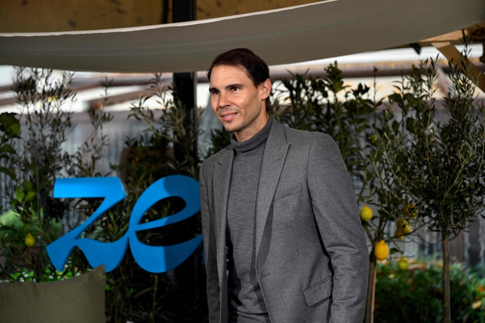Spanish tennis player Rafael Nadal poses during the presentation of Melia Hotel Group's new line of hotels Zel, in Madrid on December 15, 2022. (Photo by OSCAR DEL POZO / AFP)