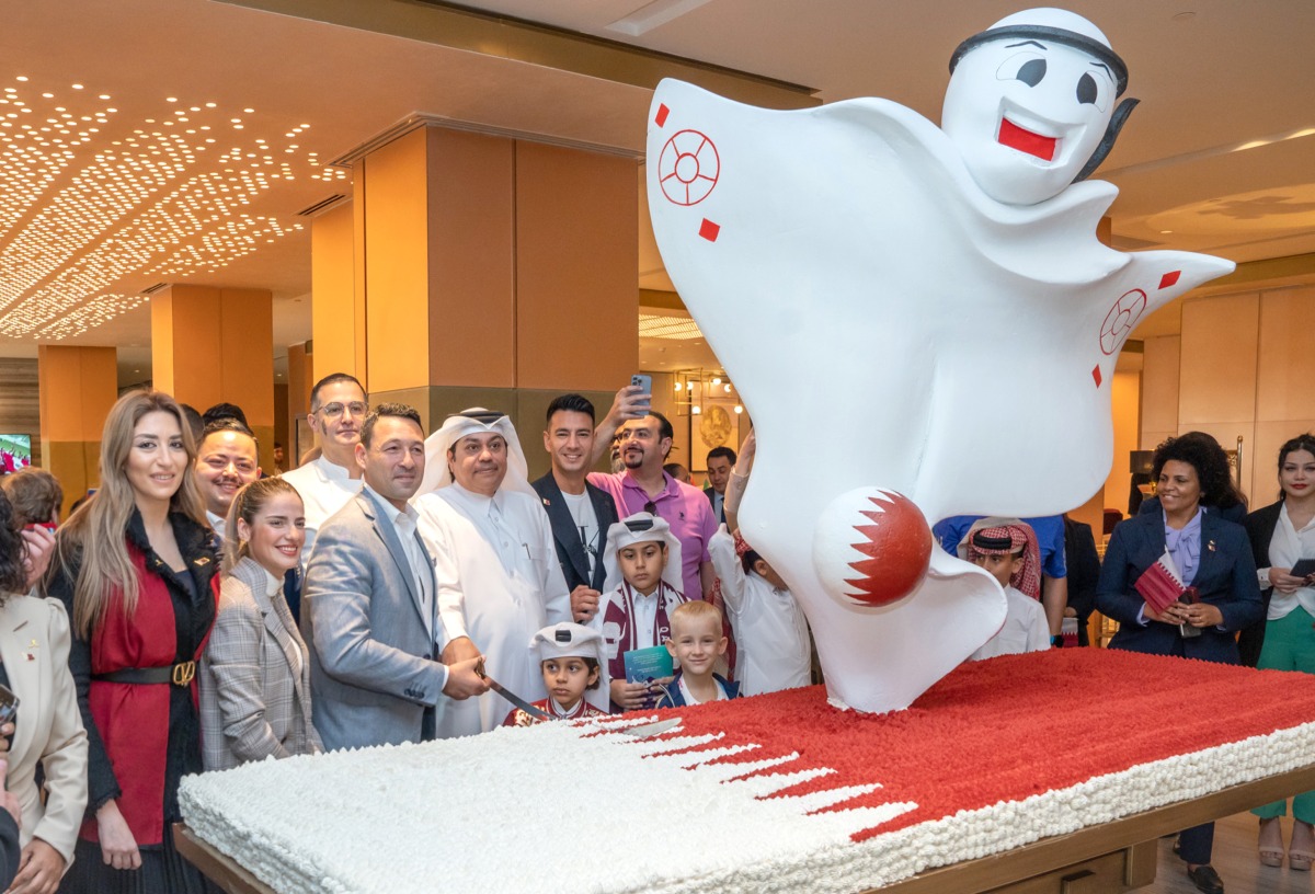 Officials and guests at a Qatar National Day celebration held at Rixos Gulf Hotel Doha.