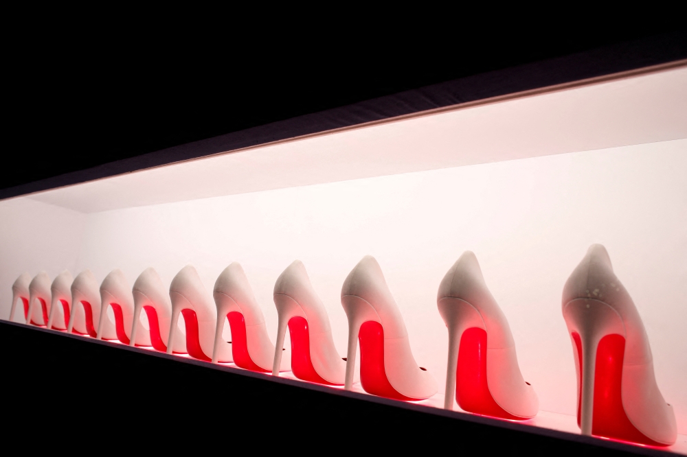 Creations by French shoe designer Christian Louboutin are displayed during a press preview of his exhibition 'L'Exhibition[niste]' (The exhibition[ist]) in Paris, France, February 21, 2020. (REUTERS/Benoit Tessier)