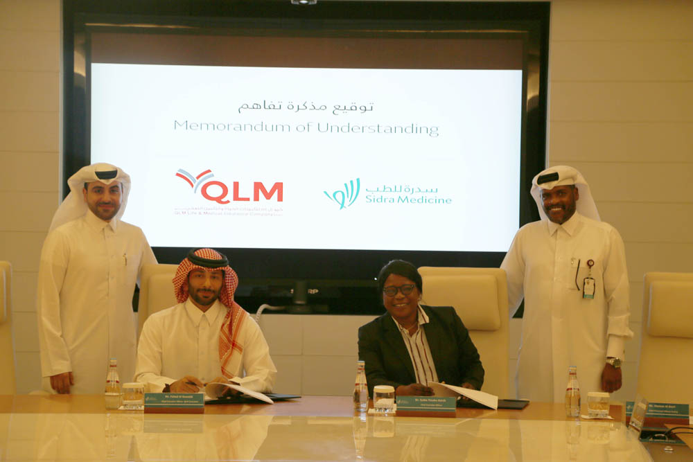 Officials at Sidra Medicine and QLM Life and Medical Insurance Company during the signing ceremony. 