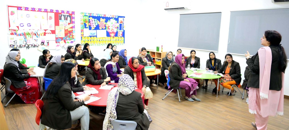 Teachers during a session of orientation programme at MES Indian School.