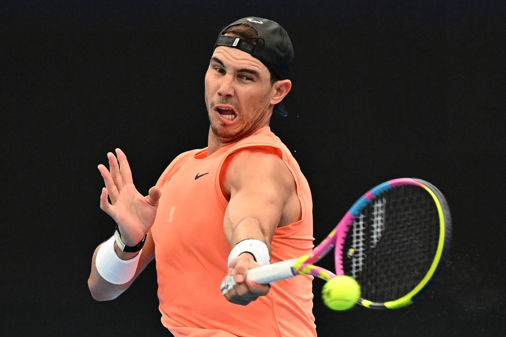 Rafael Nadal of Spain attends a practice session at the Tennis Centre in Sydney on December 28, 2022, ahead of the United Cup tennis tournament. (Photo by SAEED KHAN / AFP) 