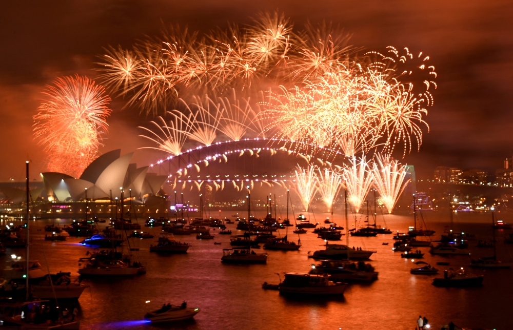 Fireworks explode over Sydney Harbour during the New Year's Eve celebrations in Sydney, Australia, on January 1, 2023. REUTERS/Jaimi Joy