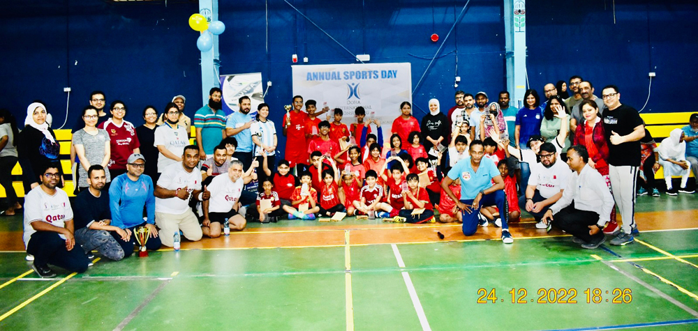 Doha International Consulting Group and Jupiter Sports Club officials and award winners pose for a photograph at the conclusion of the event.