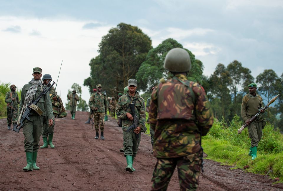 Congolese M23 rebels are seen as they withdraw from the 3 antennes location in Kibumba, near Goma, North Kivu province of the Democratic Republic of Congo, December 23, 2022. REUTERS/Arlette Bashizi