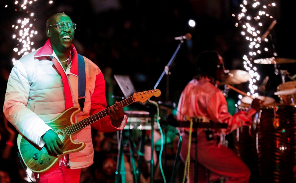 Bien Aime Baraza, the lead singer and songwriter of Sauti Sol, a Kenyan Afro-fusion band performs during the Sol Fest Concert themed SolFest Class of 2022, at the Kenyatta International Convention Centre (KICC) in Nairobi, Kenya December 18, 2022. Reuters/Thomas Mukoya
