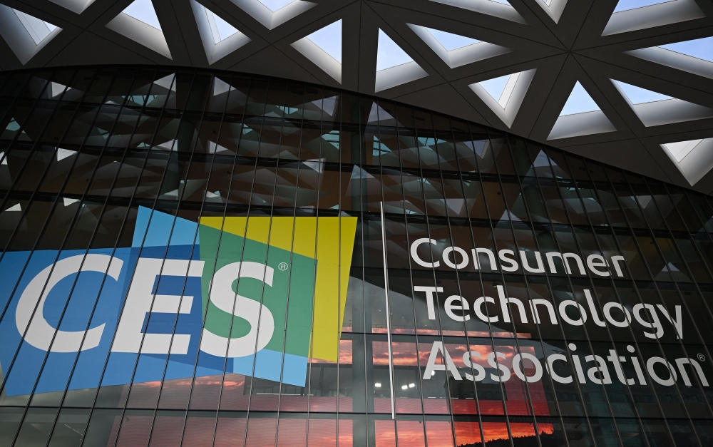 Signs advertise CES 2023, the world's largest annual consumer electronics show, outside the Las Vegas Convention Center on January 3, 2023 in Las Vegas Nevada. Photo by Robyn BECK / AFP