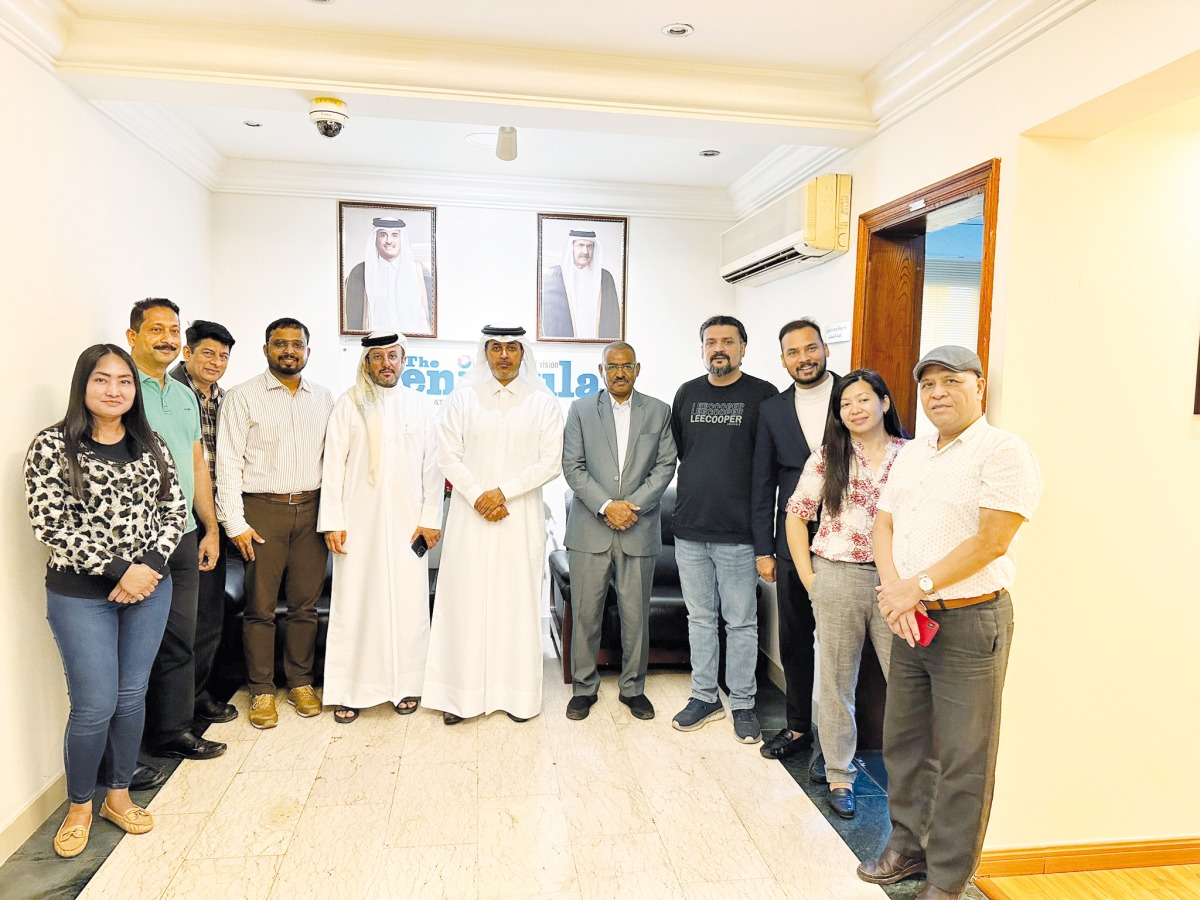 The Peninsula Advertising Department staff with Editor-in-Chief of The Peninsula Dr. Khalid Mubarak Al-Shafi, Managing Editor of The Peninsula Mohammed Osman Ali, Advertising Manager of Dar Al Sharq Group, Jassem Salman, and Assistant Advertising Manager Sushil Menon.