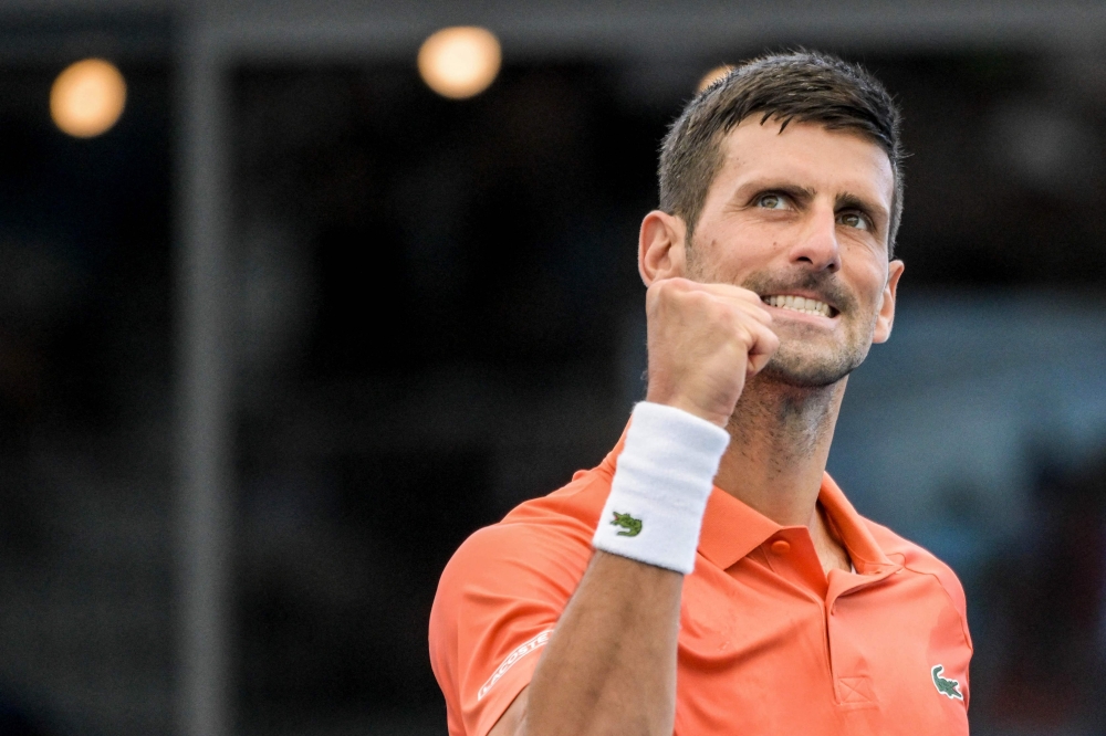 Serbia's Novak Djokovic celebrates his victory against France's Quentin Halys during their men's singles match at the Adelaide International tennis tournament in Adelaide on January 5, 2023. (Photo by Brenton EDWARDS / AFP)