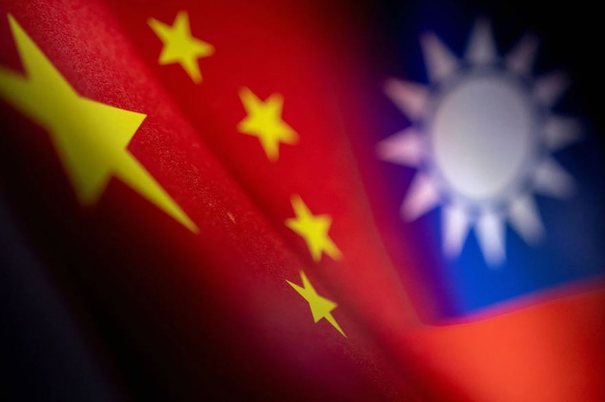 Chinese and Taiwanese printed flags are seen in this illustration taken April 28, 2022. (REUTERS/Dado Ruvic)