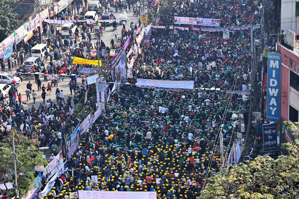 Bangladesh Nationalist Party (BNP) activists gather during an anti-government rally in Dhaka on January 11, 2023. (Photo by Munir uz zaman / AFP)