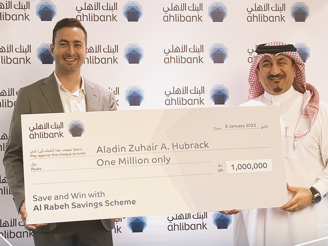 Aladin Hubrack receives the prize from Mohamed Al Namla, Deputy CEO Business Support, Services and Human Resources at Ahlibank.