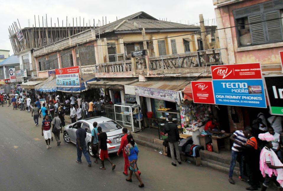 File Photo: People walk on the street around Kwame Nkrumah circle in Accra, Ghana, December 2, 2016. (REUTERS/Luc Gnago)