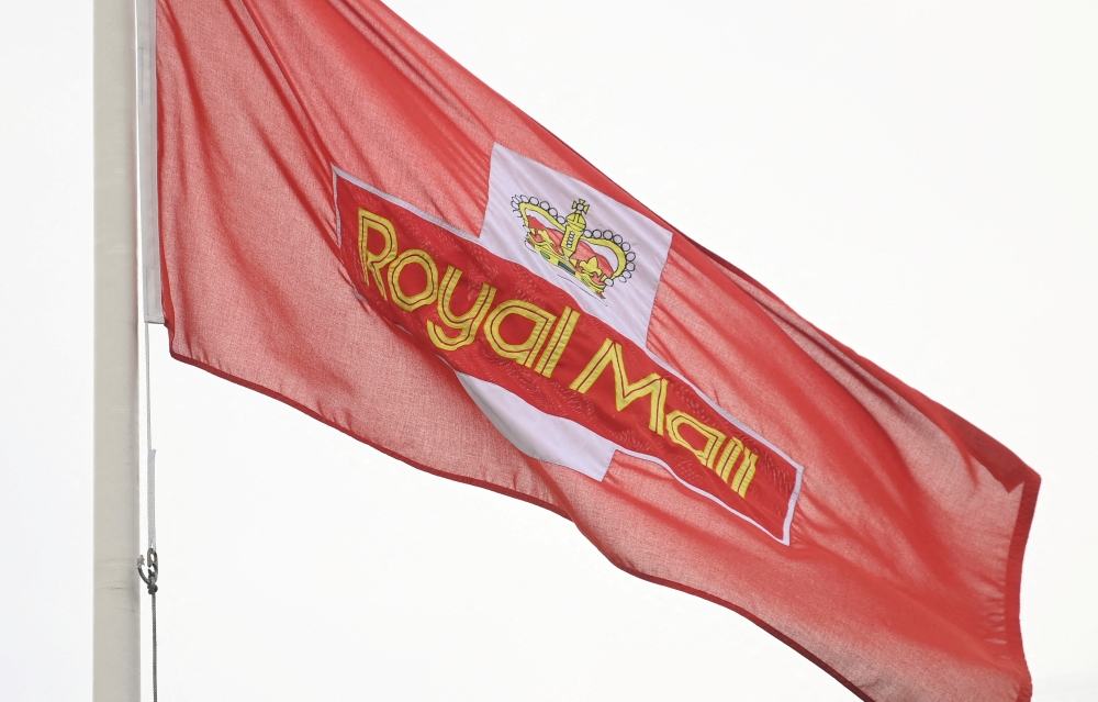  A Royal Mail flag flies near a sorting office as workers strike, in west London, Britain, on November 24, 2022. File Photo / Reuters